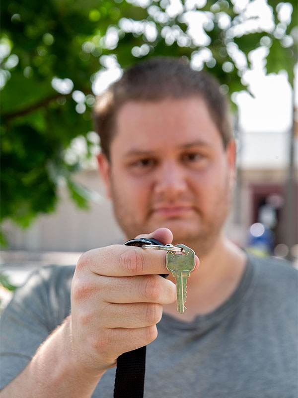 Josh holding a key