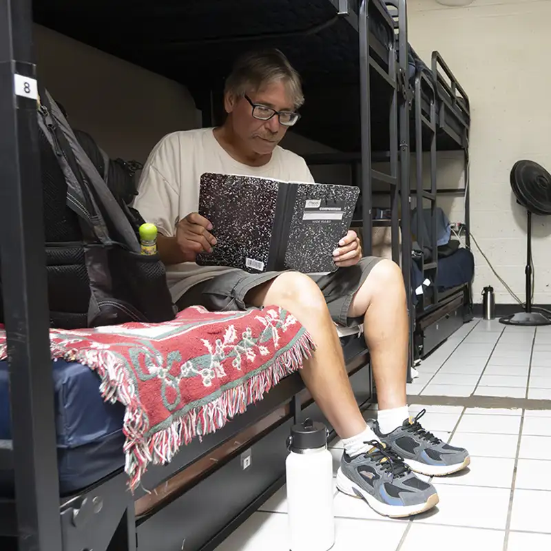Guest in shelter on bunk